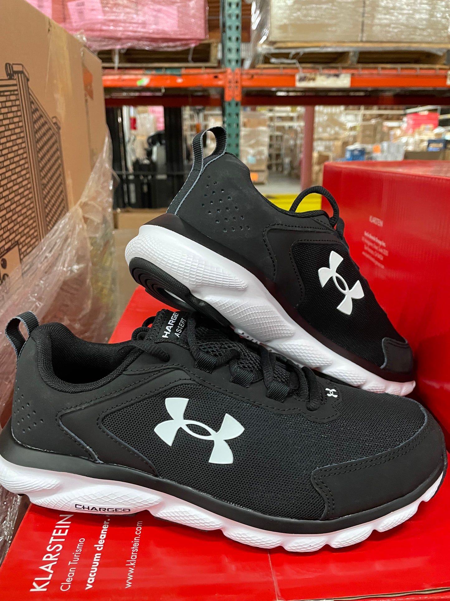 LOT #35 Under Armour Charged Assert 9 4E Running Shoes Black (Quantity 144. Retail $8640) PICKUP ONLY!